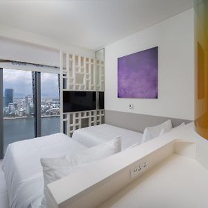 Zimmer mit zwei Einzelbetten und mit Flussblick